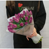 Buy a bouquet of purple tulips