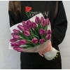 Buy a bouquet of purple tulips