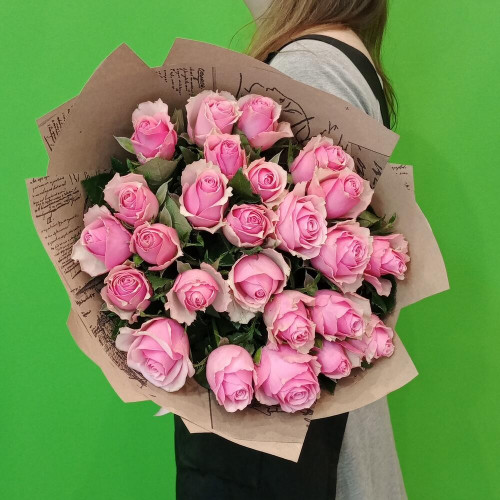 A bouquet of pink roses in craft