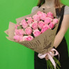 A bouquet of pink roses in craft